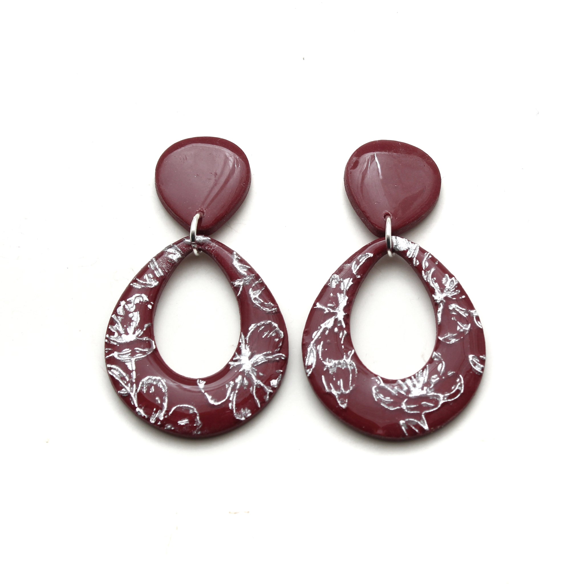 Sangria Silver Floral Embossed Earrings