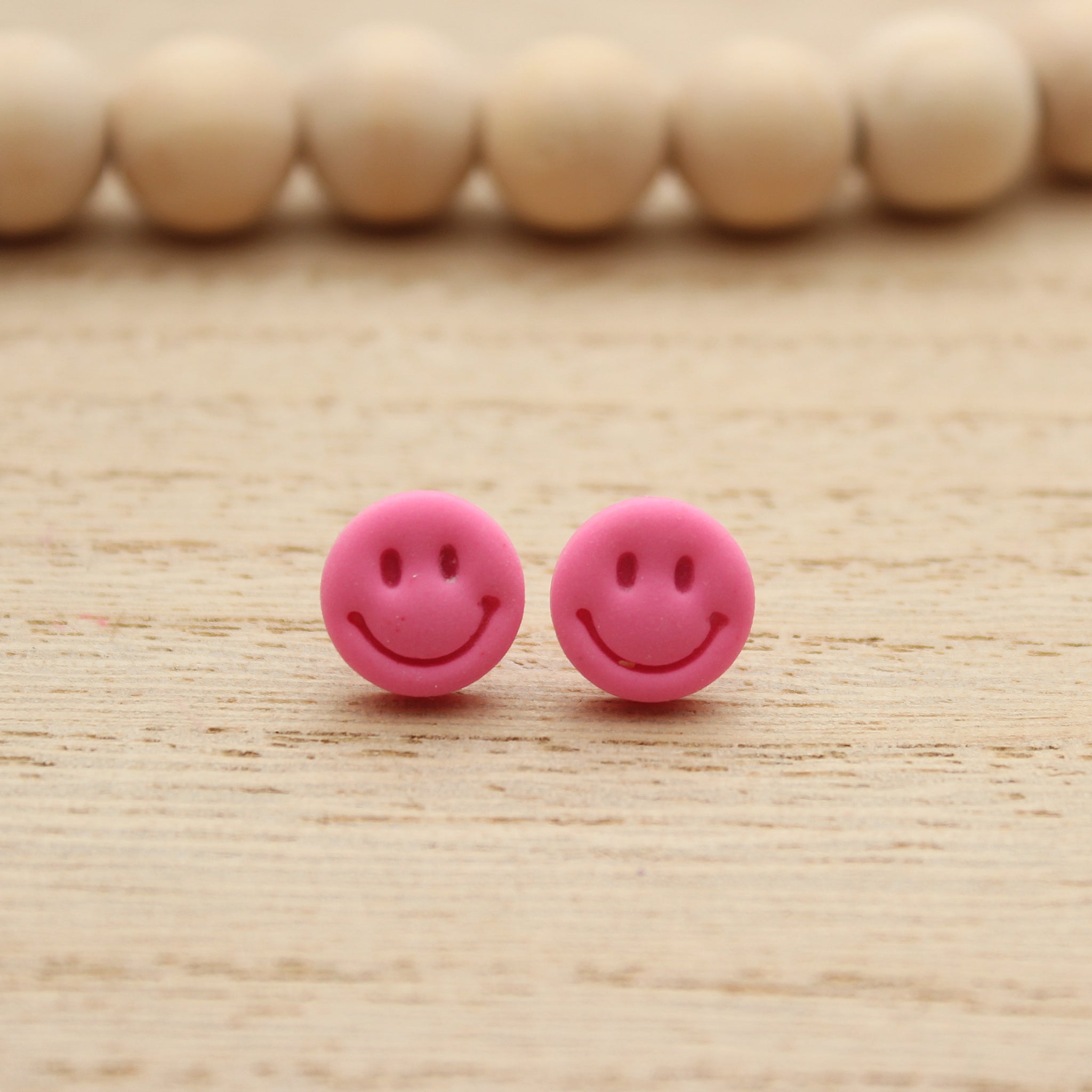 Neon Pink Smiley Face Stud Earrings