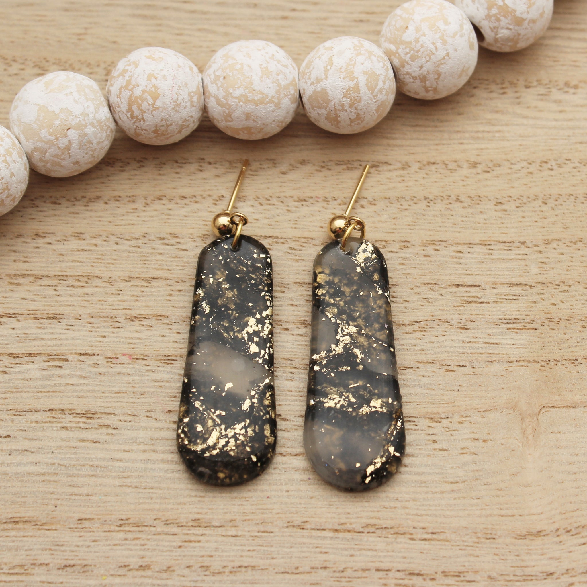 Black and Gold Translucent Elongated Oval Dangle Earrings